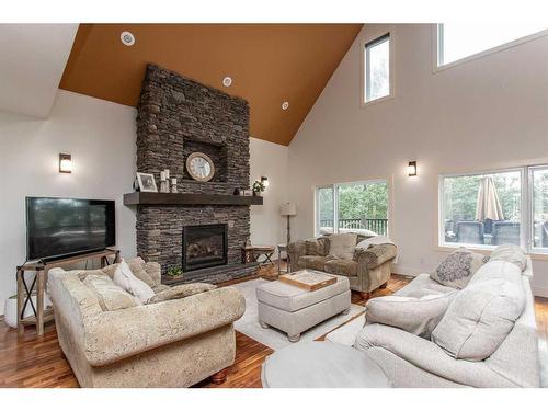 431 Summer Crescent, Rural Ponoka County, AB - Indoor Photo Showing Living Room With Fireplace