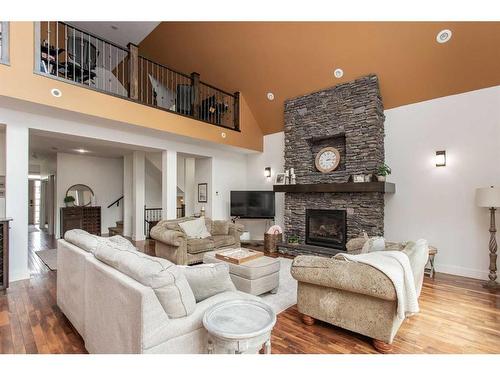 431 Summer Crescent, Rural Ponoka County, AB - Indoor Photo Showing Living Room With Fireplace