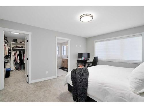 10 Songbird Green, Sylvan Lake, AB - Indoor Photo Showing Bedroom