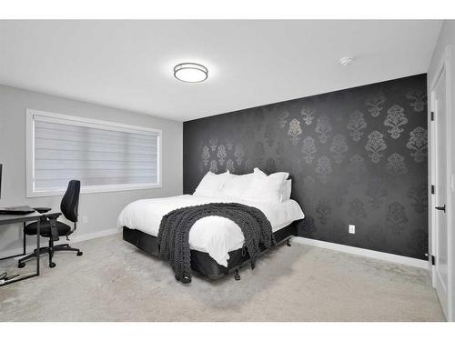 10 Songbird Green, Sylvan Lake, AB - Indoor Photo Showing Bedroom