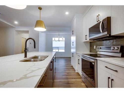 10 E Evergreen Way, Red Deer, AB - Indoor Photo Showing Kitchen With Double Sink