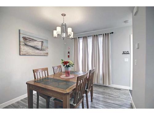 13 Iron Gate Boulevard, Sylvan Lake, AB - Indoor Photo Showing Dining Room