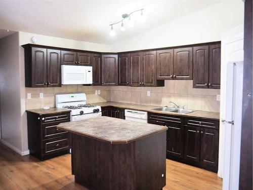 6197 Orr Drive, Red Deer, AB - Indoor Photo Showing Kitchen With Double Sink