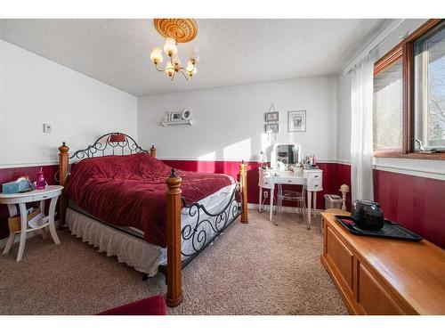 49 Wiltshire Boulevard, Red Deer, AB - Indoor Photo Showing Bedroom