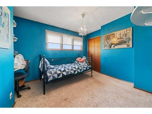 49 Wiltshire Boulevard, Red Deer, AB - Indoor Photo Showing Bedroom