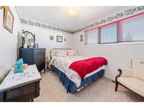 49 Wiltshire Boulevard, Red Deer, AB - Indoor Photo Showing Bedroom