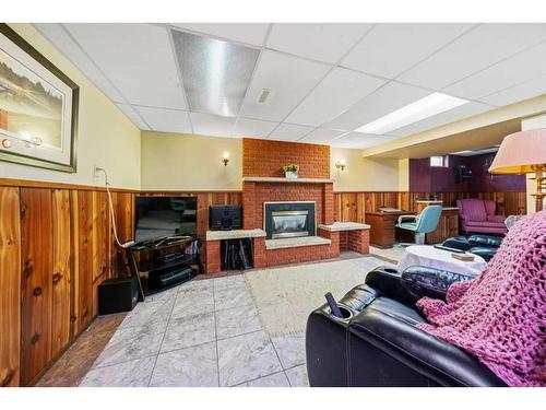 49 Wiltshire Boulevard, Red Deer, AB - Indoor With Fireplace