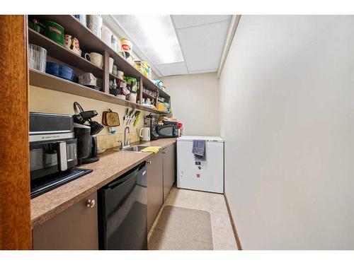 49 Wiltshire Boulevard, Red Deer, AB - Indoor Photo Showing Laundry Room