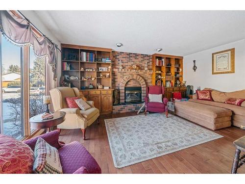 49 Wiltshire Boulevard, Red Deer, AB - Indoor Photo Showing Living Room With Fireplace