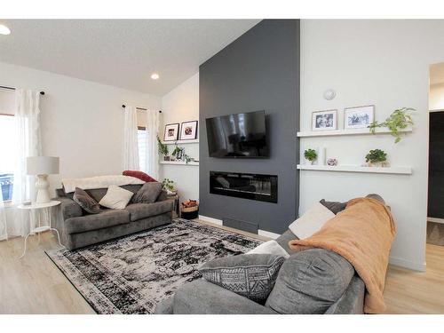 136 Ahlstrom Close, Red Deer, AB - Indoor Photo Showing Living Room With Fireplace