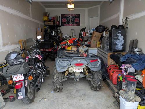 97 Metcalf Way, Lacombe, AB - Indoor Photo Showing Garage