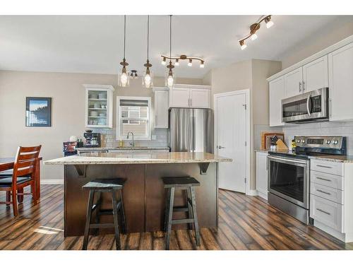 18 Cole Way, Sylvan Lake, AB - Indoor Photo Showing Kitchen With Stainless Steel Kitchen With Upgraded Kitchen