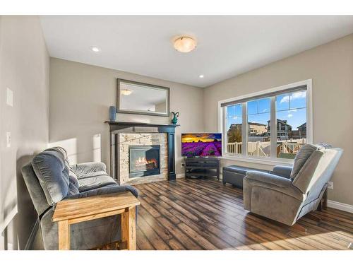 18 Cole Way, Sylvan Lake, AB - Indoor Photo Showing Living Room With Fireplace