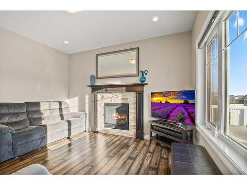 18 Cole Way, Sylvan Lake, AB - Indoor Photo Showing Living Room With Fireplace