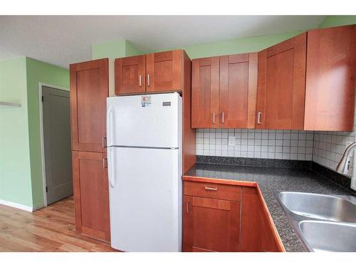 29 Abbott Close, Red Deer, AB - Indoor Photo Showing Kitchen With Double Sink