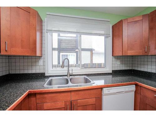 29 Abbott Close, Red Deer, AB - Indoor Photo Showing Kitchen With Double Sink