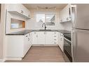 5007 58 Street, Lacombe, AB  - Indoor Photo Showing Kitchen With Double Sink With Upgraded Kitchen 