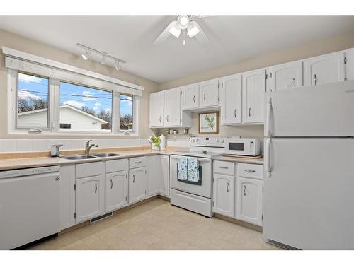 5892 West Park Crescent, Red Deer, AB - Indoor Photo Showing Kitchen With Double Sink