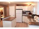 20 Arthur Close, Red Deer, AB  - Indoor Photo Showing Kitchen With Double Sink 