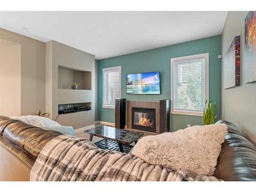 123 Morris Court, Blackfalds, AB - Indoor Photo Showing Living Room With Fireplace