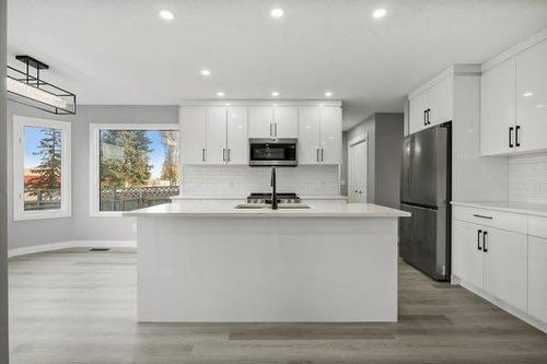 64 Sandringham Close Nw, Calgary, AB - Indoor Photo Showing Kitchen With Upgraded Kitchen