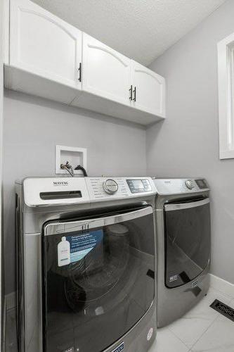 64 Sandringham Close Nw, Calgary, AB - Indoor Photo Showing Laundry Room