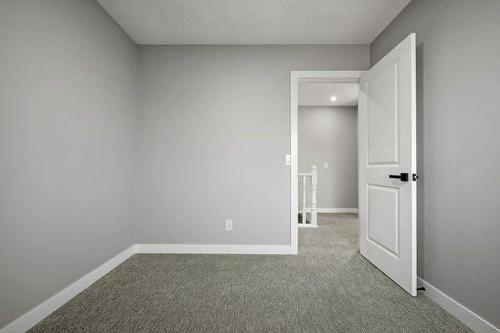 64 Sandringham Close Nw, Calgary, AB - Indoor Photo Showing Other Room