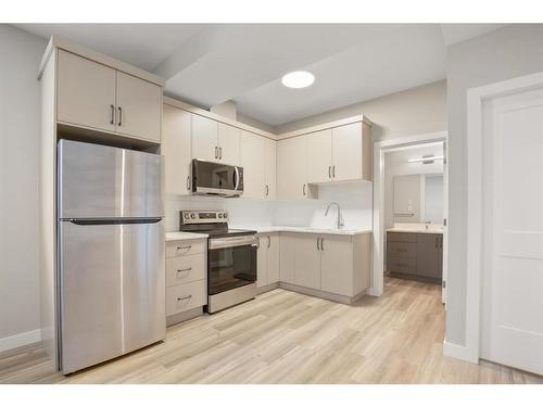 22 Palmer Circle, Blackfalds, AB - Indoor Photo Showing Kitchen