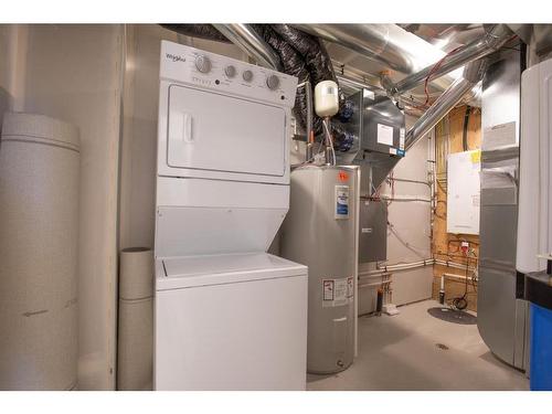 22 Palmer Circle, Blackfalds, AB - Indoor Photo Showing Laundry Room