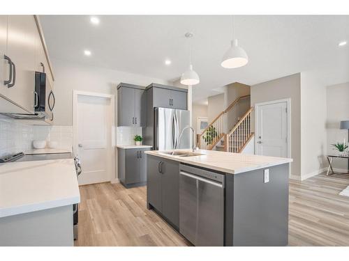 22 Palmer Circle, Blackfalds, AB - Indoor Photo Showing Kitchen With Double Sink With Upgraded Kitchen