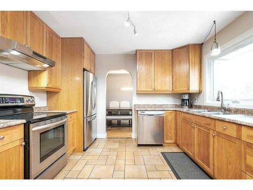 4024 39 Street, Red Deer, AB - Indoor Photo Showing Kitchen With Double Sink