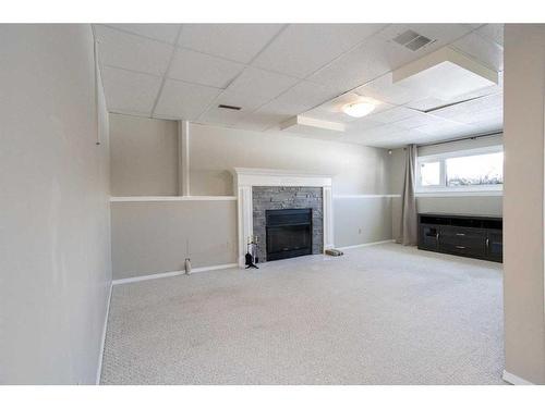 12 Richards Close, Red Deer, AB - Indoor With Fireplace