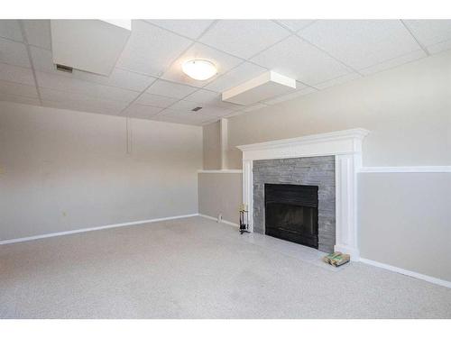 12 Richards Close, Red Deer, AB - Indoor With Fireplace