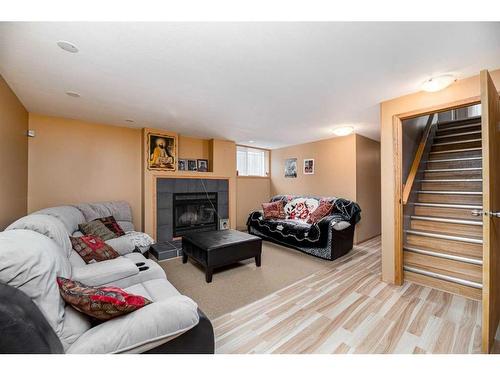 625 Lancaster Drive, Red Deer, AB - Indoor With Fireplace