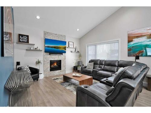 110 Lalor Drive, Red Deer, AB - Indoor Photo Showing Living Room With Fireplace