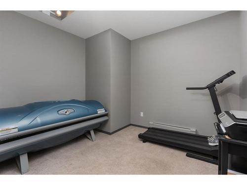 B-4821 54 Street, Camrose, AB - Indoor Photo Showing Gym Room