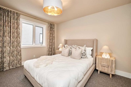 233 Rowmont Drive Nw, Calgary, AB - Indoor Photo Showing Bedroom