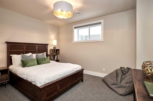 233 Rowmont Drive Nw, Calgary, AB - Indoor Photo Showing Bedroom