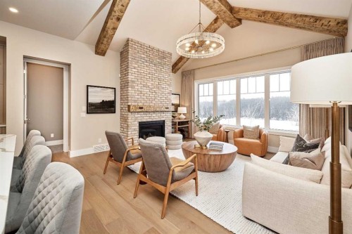 233 Rowmont Drive Nw, Calgary, AB - Indoor Photo Showing Living Room With Fireplace
