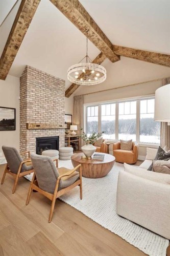 233 Rowmont Drive Nw, Calgary, AB - Indoor Photo Showing Living Room With Fireplace