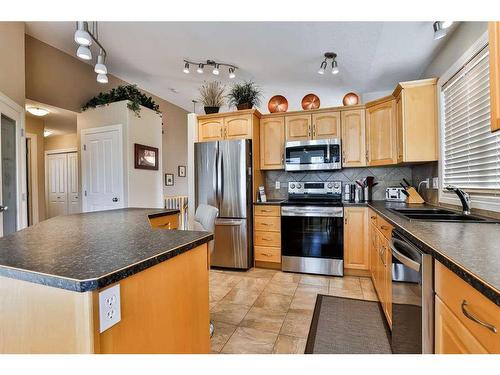 133 Rivermont Crescent West, Lethbridge, AB - Indoor Photo Showing Kitchen With Stainless Steel Kitchen With Double Sink