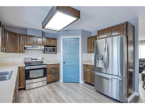 4702 52 Avenue, Clive, AB - Indoor Photo Showing Kitchen With Double Sink