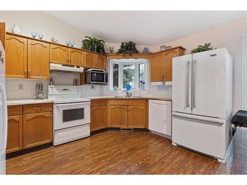 106 Abbey Street, Bittern Lake, AB - Indoor Photo Showing Kitchen With Double Sink