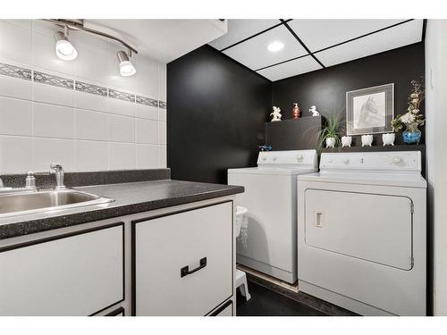 106 Abbey Street, Bittern Lake, AB - Indoor Photo Showing Laundry Room