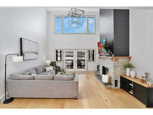 4-13033 424 Township, Rural Ponoka County, AB - Indoor Photo Showing Living Room With Fireplace