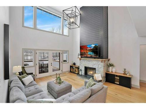 4-13033 424 Township, Rural Ponoka County, AB - Indoor Photo Showing Living Room With Fireplace