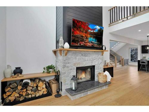 4-13033 424 Township, Rural Ponoka County, AB - Indoor Photo Showing Living Room With Fireplace