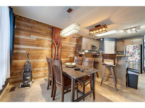 51 Lodge Place, Sylvan Lake, AB - Indoor Photo Showing Dining Room