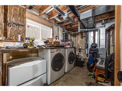 51 Lodge Place, Sylvan Lake, AB - Indoor Photo Showing Laundry Room