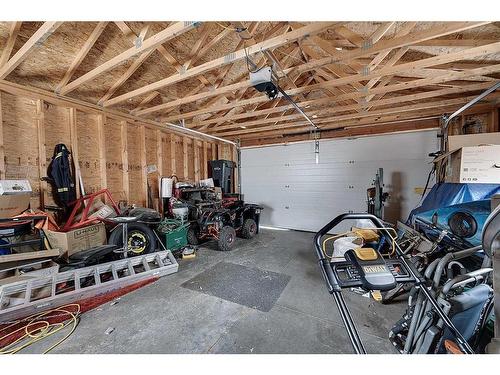 51 Lodge Place, Sylvan Lake, AB - Indoor Photo Showing Garage